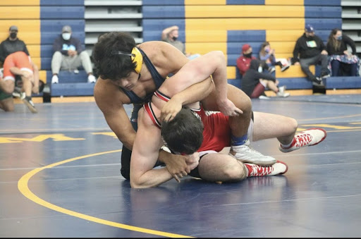 PHOTO COURTESY OF Coach Samuel Marshal Thomas:
This picture shows a Millikan Wrestling athlete during a match.