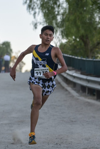 PHOTO COURTESY OF Millikan Cross Country booster parents: 
Jason Parra running during a race.