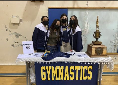 PHOTO COURTESY OF @millikan.gymnastics
Millikan Gymnastics team members at Site Night with Moore League Champion Trophy
