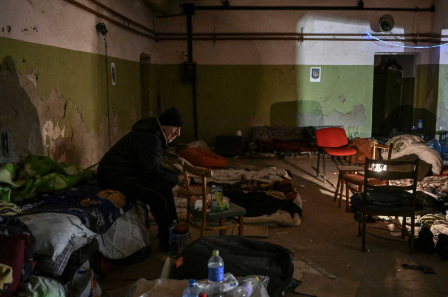 PHOTO COURTESY OF Aris Messinis 
Picture found in a picture show from NPR showing the effects of the Russia/Ukraine war on Ukrainian people
Mar. 10: A resident sits in a basement for shelter in Irpin. Kyivs northwest suburbs, including Irpin and Bucha, have endured shellfire and bombardments for more than a week, prompting massive evacuation efforts.