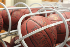 Photo of basketballs in cage