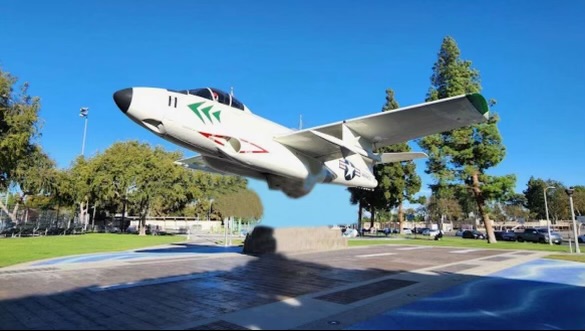 Photo of a plane replica in a Long Beach park.