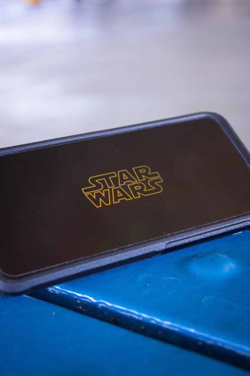 Photo of the Star Wars logo on a phone.