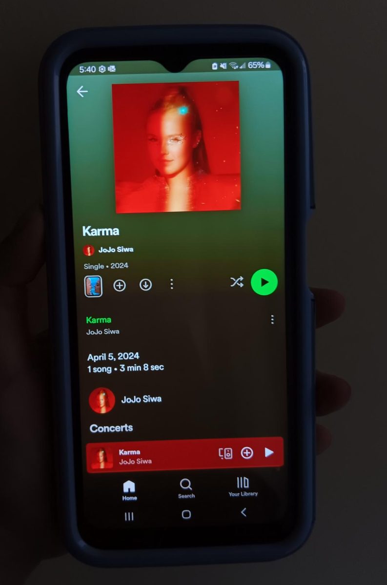 Photo of Karma by JoJo Siwa on Spotify.