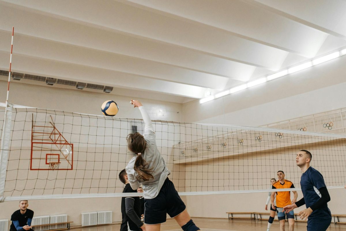 Photo of Woman playing Volleyball.