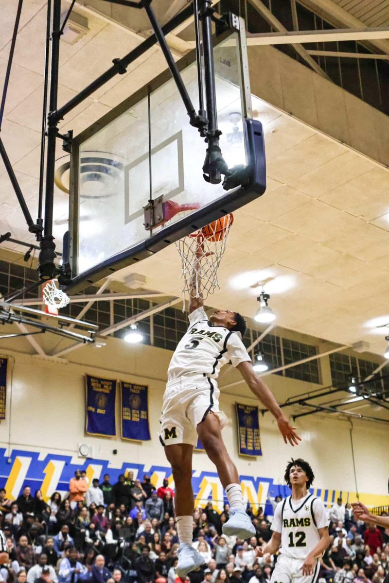 Quali Giran(5) dunks against Lakewood high school